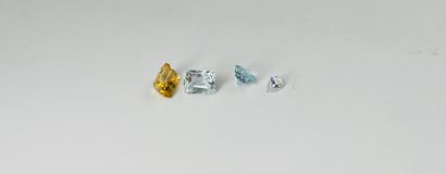 一批四颗宝石，包括一颗白宝石，两颗海蓝宝石和一颗黄水晶。总重量：约7.10克拉。