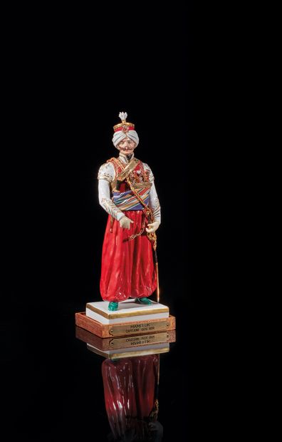 Porcelain figurine inscribed on the square...