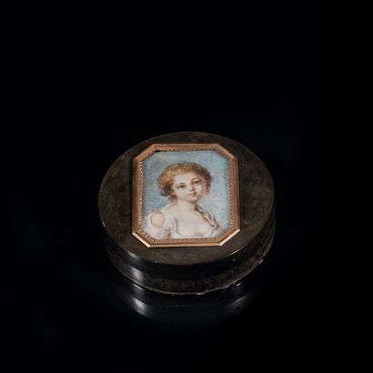 Circular tortoiseshell box with lid decorated...