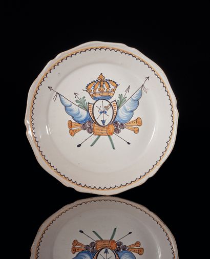 NEVERS
A contoured earthenware plate with...