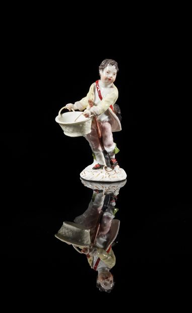 MEISSEN
Statuette depicting a young man holding...