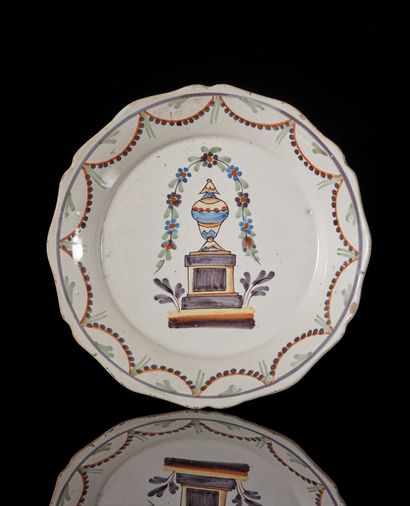 NEVERS
A large earthenware plate of contoured...