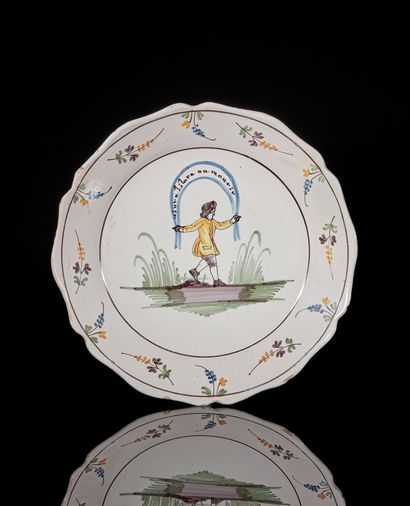 NEVERS
A contoured earthenware plate with...