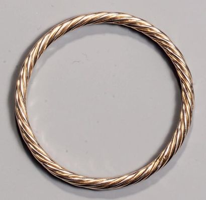 Bracelet rigide en fils de 2 ors torsadés....