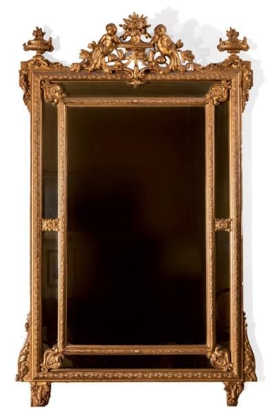 Miroir à parecloses en bois et stuc redoré,...