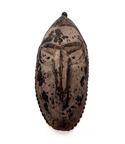 Ramu mask in carved wood with geometric decoration.
PAPUA,...
