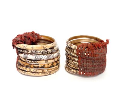 Two seven-row bracelets in chased and patinated...