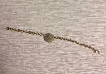 蒂芙尼公司
18K (750th) 金手镯，由贾塞隆网眼组成，中间有一个椭圆形饰牌，上面刻有...