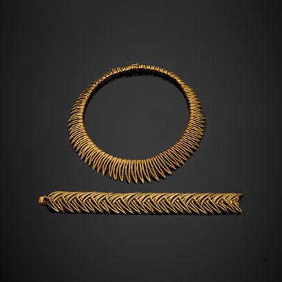 毛布辛
半镶 18K 金（750 足金），包括项链和手链，手链以扭转的 S 形线衔接棕榈叶，项链的链节落在奥尔维特网眼上。饰有安全扣。项链上有...