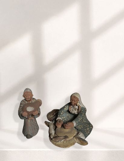 8 figurines orientales représentant des métiers...