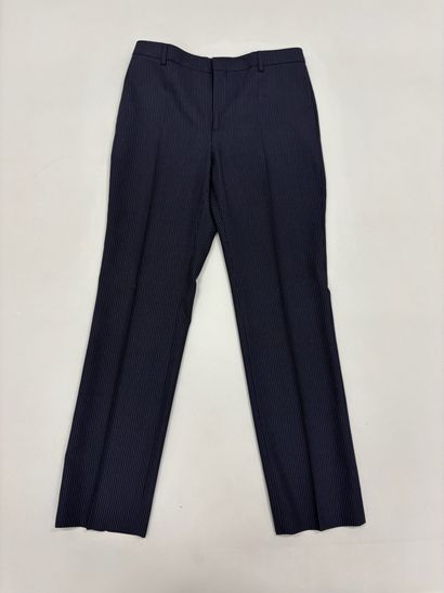 CELINE. 
Pantalon de tailleur bleu rayé....