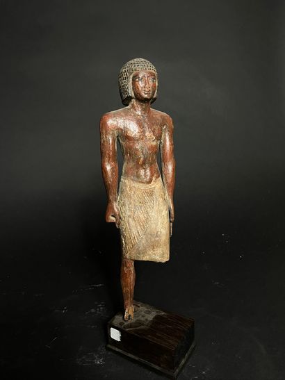STATUETTE OF A DIGNITARY 
made of painted...