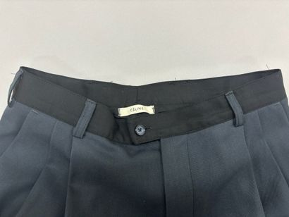CELINE. 
Pantalon de tailleur bi-color noir...