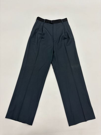 CELINE. 
Pantalon de tailleur bi-color noir...