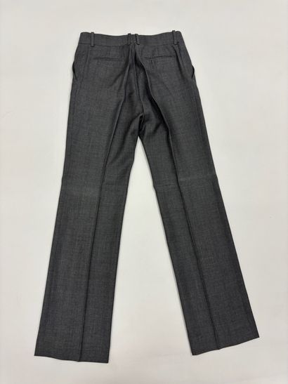 CELINE. 
Pantalon de tailleur gris. (Taille...