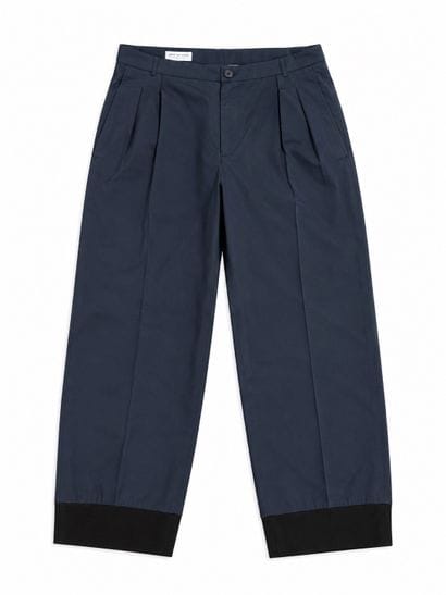 DRIES VAN NOTEN. 
Pantalon bicolore bleu...