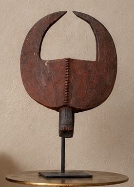 MASK 
made of wood with horn motifs. 
H....