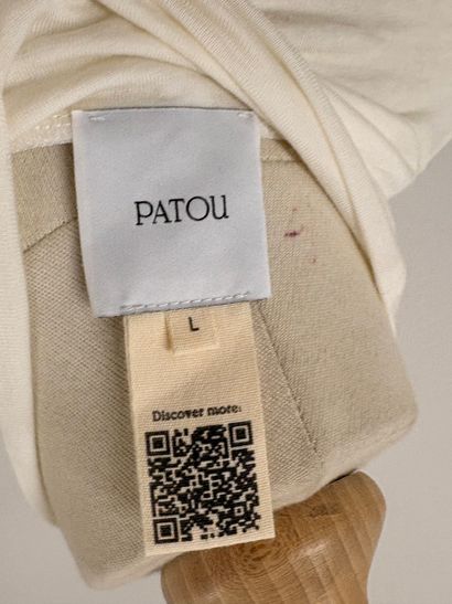 PATOU. 
Haut à manches longues col roulé...