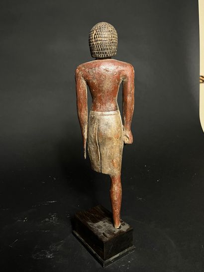 STATUETTE OF A DIGNITARY 
made of painted...