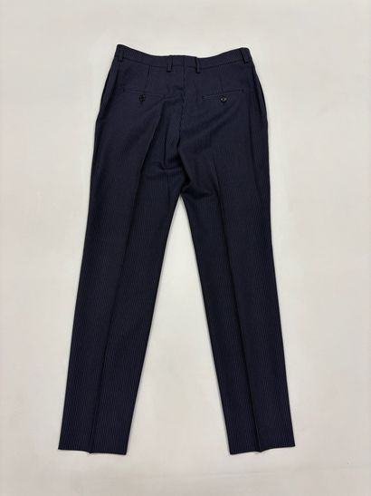 CELINE. 
Pantalon de tailleur bleu rayé....