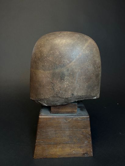 MAN'S HEAD
made of brown stone, on an antique...