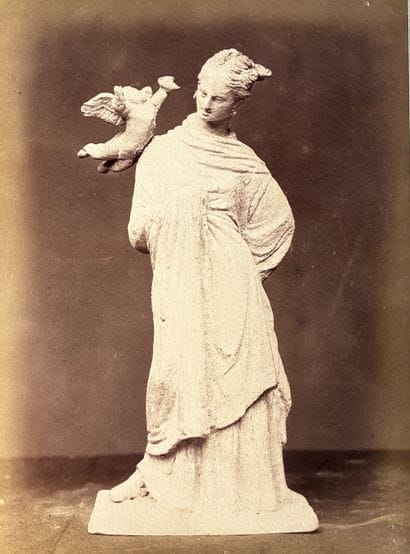 PHOTOGRAPH 
in sepia depicting a Tanagra....