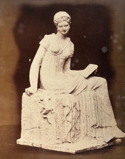 PHOTOGRAPH 
in sepia depicting a Tanagra....