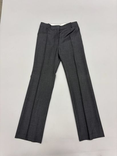 CELINE. 
Pantalon de tailleur gris. (Taille...
