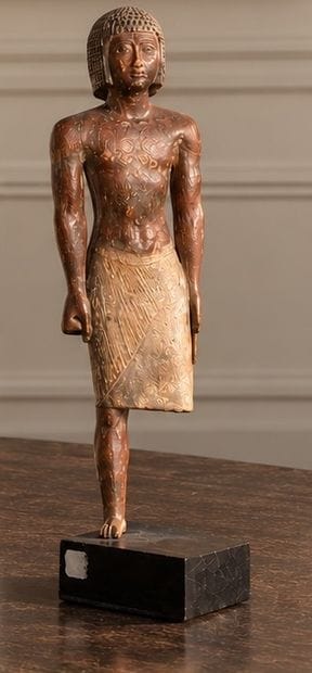 STATUETTE OF A DIGNITARY 
made of painted...