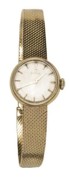 OMEGA
Montre de dame en or jaune 18k, bracelet...