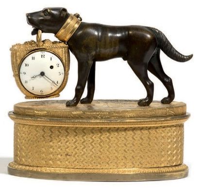 Pendulette ovale formant encrier en bronze...