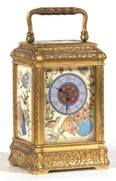Pendulette de voyage en bronze doré et plaques...