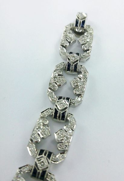 Bracelet articulé or gris 750 millièmes serti...