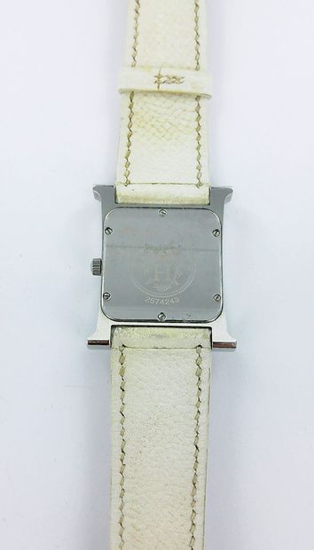 HERMES, H.
Steel watch with a leather strap,...