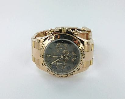 ROLEX, Daytona.
750-thousandths rose gold...