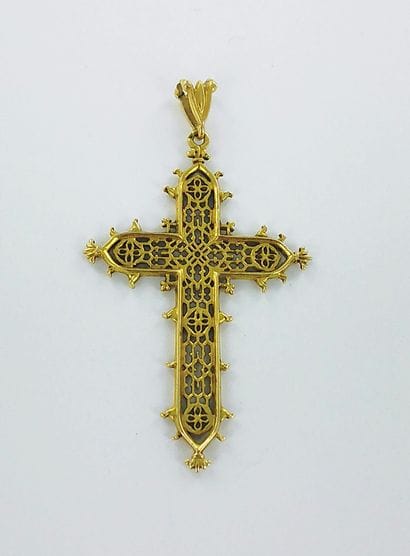 750-thousandths gold filigree cross pendant....