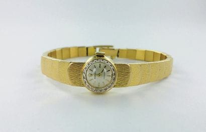 ROLEX, Precision.
Women's gold watch on a...