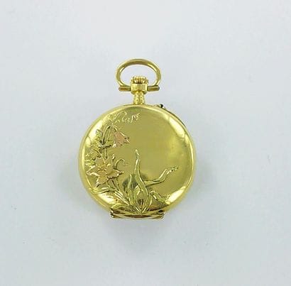 750-thousandths gold pocket watch with a...