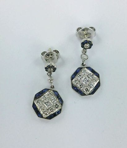 Pair of 750 white gold earrings set with...