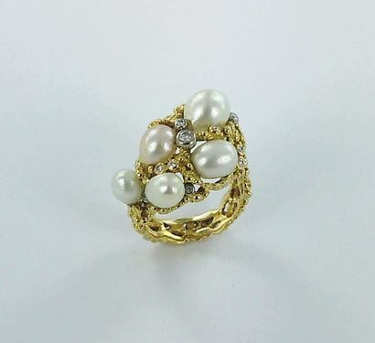 GILBERT ALBERT.
750-th gold ring set with...
