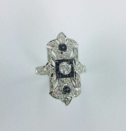 750-thousandths white gold ring set with...