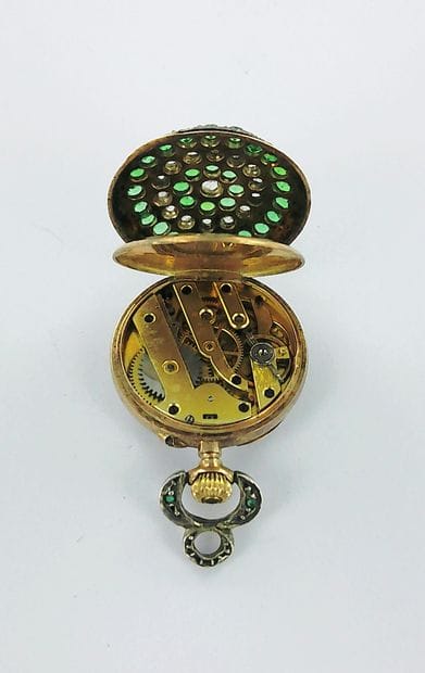 750-thousandths gold collar watch set with...