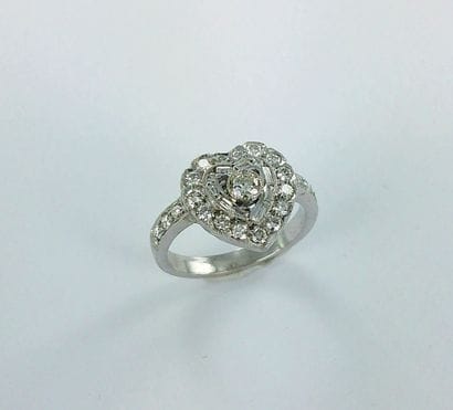 750-thousandths white gold heart-shaped ring...