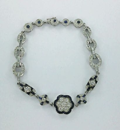 Bracelet or gris 750 milièmes à motifs géométriques...