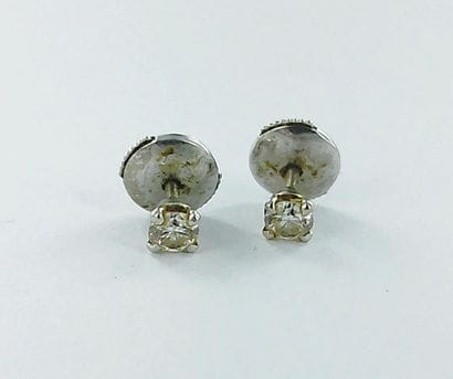 Pair of 750 white gold earrings set with...
