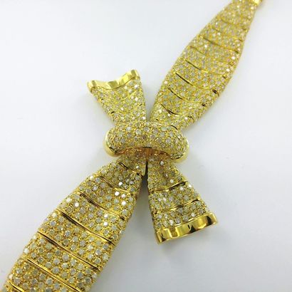 Bracelet articulé or 750 millièmes serti...