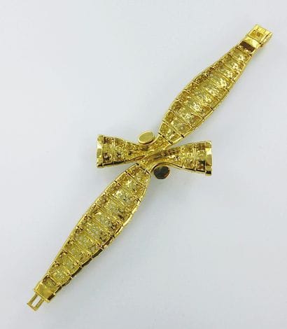 Bracelet articulé or 750 millièmes serti...