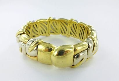 Flexible 750-th gold bracelet with a floral...