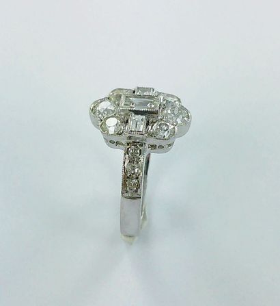 750-thousandths white gold ring set with...