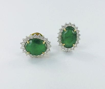 Pair of 750 two-tone gold earrings set with...
